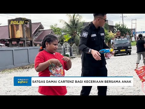 SATGAS OPS DAMAI CARTENZ BERBAGI KECERIAAN BERSAMA ANAK ANAK DI MIMIKA