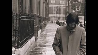 Richard Ashcroft on a beach