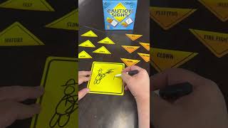 Ryan tries Caution Signs!