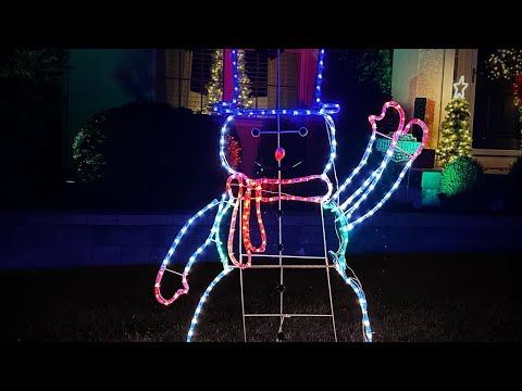 Fraser Hill Farm 2024 5-Ft. Prelit LED Snowman with Waving Arm Outdoor Decoration