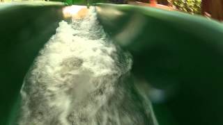 preview picture of video 'Backwards view of 1/4 mile long waterslide in Costa Rica'