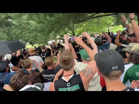 The Cavaliers drumline do that claw thing in the rain at finals