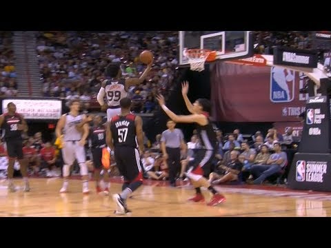 Zhou Qi swats Josh Jackson's drive