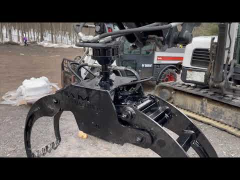 E-60 Excavator w/ Pass Through Log Grapple