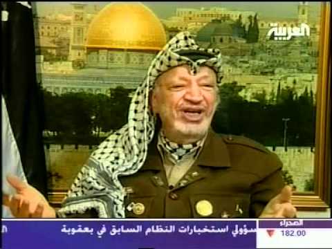 لقاء تلفزيوني للرئيس الراحل ياسر عرفات يرد بجرأة .MPG