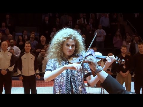 This violinist kept playing the National Anthem after the NBA sound system blew out!