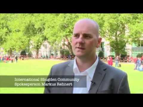 ISC protesters greet the Dalai Lama as he arrives in Hamburg
