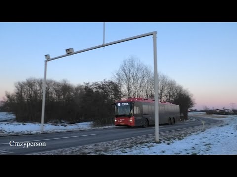 Scania Bussen Overweg Heenvliet in Sneeuw bij Zonsondergang