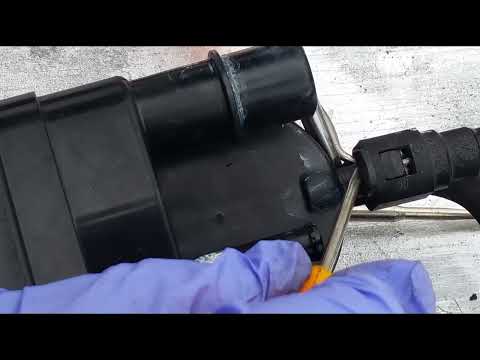 How to unplug a Toyota charcoal canister vapor hose connections