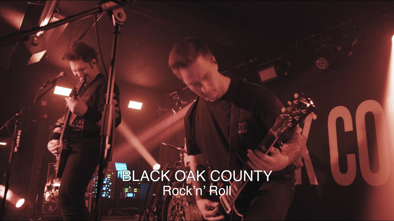 Live footage still from the official video for Rock'n'Roll by Danish hard rock band Black Oak County