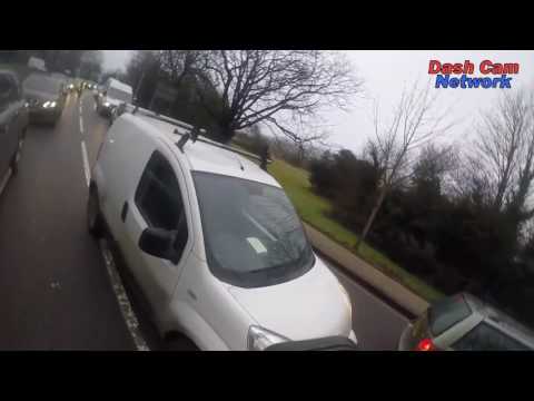 Angry Motorist Argues With Cyclist After Using Phone In Car