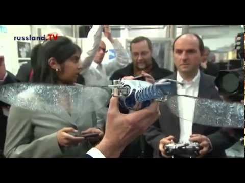 Messeeröffnung durch Putin und Merkel