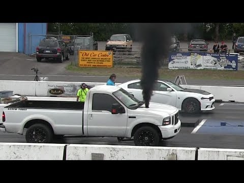 Pickup trucks on steroids-drag racing,ford f-150,Hellcat,Dodge Ram,Corvette