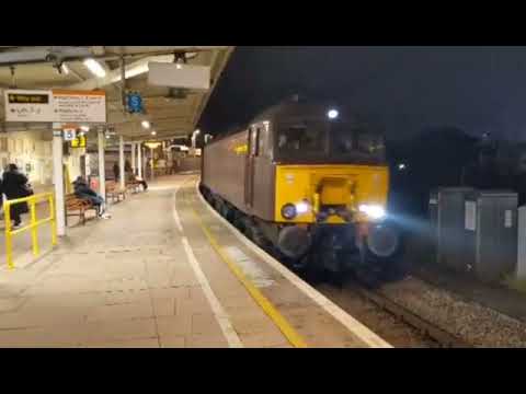 57316 and 37706 passing through Willesden Junction on the evening of Saturday 18th December 2021.