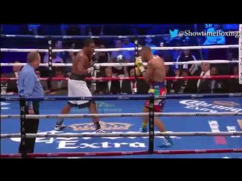 Jose Uzcategui knocks down Andre Dirrell after the bell