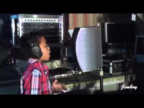 Little boy singing John Legends All of Me.