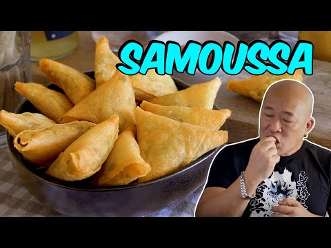 Mini samosa stuffed with beef and small vegetables