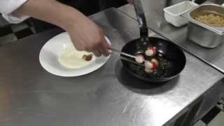Araya prepares a coquille starter at Alegre in Valparaíso, Chile