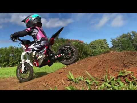 3 year old girl Hili on OSET electric dirt bike ripping up her backyard track