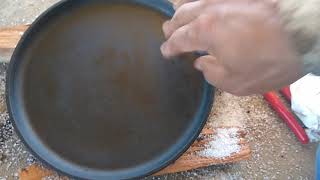Cleaning cast iron cookware with salt