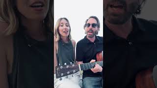 Singing songs about Canada in Canada. This is Montreal from The Green Fury on a deck in NB.