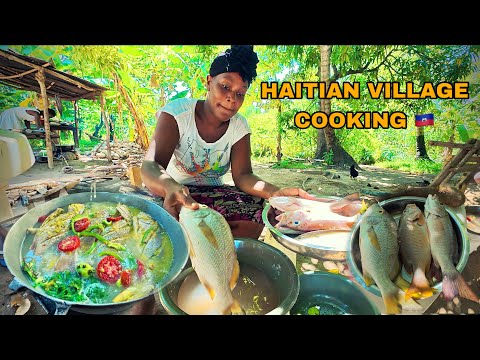 Haitian Mother cooking Fisherman Style Fish Stew for dinner