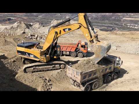 Caterpillar 385C Excavator Loading Mercedes - Man Trucks - Kivos Ate