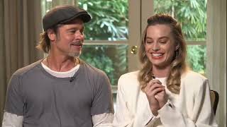 Brad Pitt can't stop flirting with Margot Robbie! video