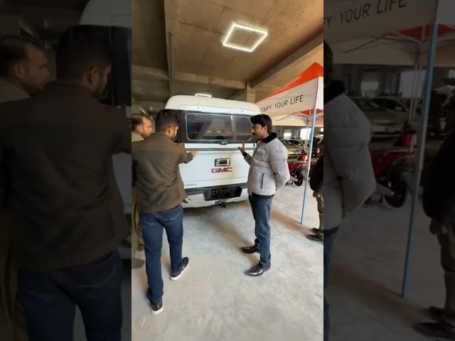 1.5 ton AC wala GMC Sierra Faisalabad Car Mela me mojud hai!