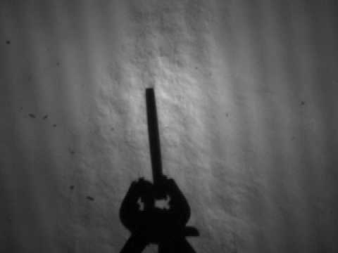 High speed schlieren video of air rifle shooting clay target