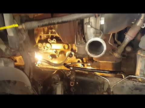 COMO SACAR EL OIL COOLER HOUSING MOTOR DETROIT 14.0 L