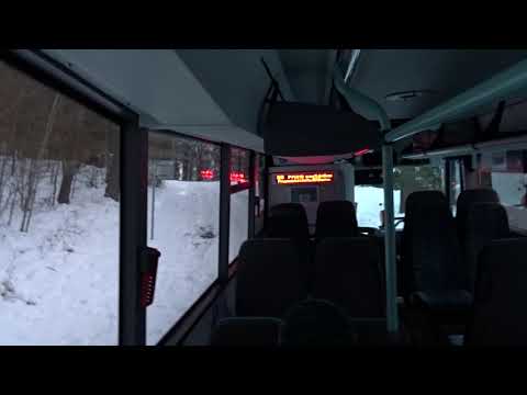 Tahání autobusu SOR CN 10,5 traktorem po uvíznutí na zledovatělé cestě na Sedlčansku (1/2)