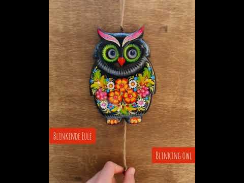 Traditional, handmade jumping jack owl wall decoration for children's rooms