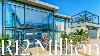 Download the video "Touring the GLASS HOUSE in Northcliff- R12 Million. INCREDIBLE!"