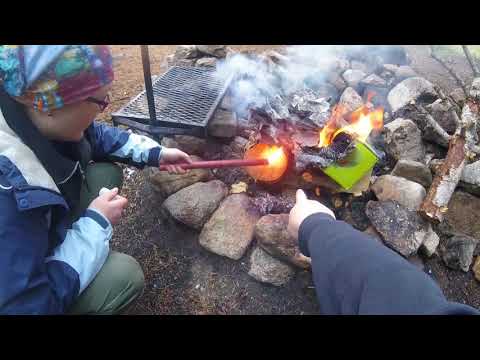 Starting a fire with wet wood and a flare (part 2)