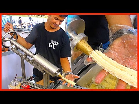Street food - Magic Making Machine Doughstick with Teh Tarik in Dessert Event