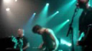 RAISED FIST working on wood