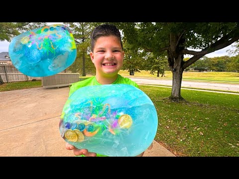 GIANT ICE EGGS Filled with Toys! Caleb & Mommy FUN Science Activity for Kids! Melting Ice Balloons!