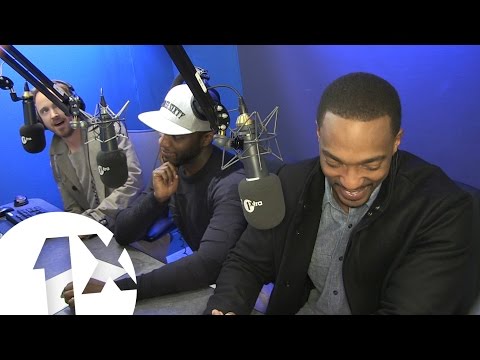 Stars of Triple 9, Aaron Paul and Anthony Mackie talk butt cakes and house parties