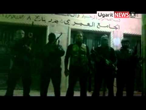 بيان يلقيه النقيب إياد الديك أثناء عملية عسكرية داخل مدينة الرستن