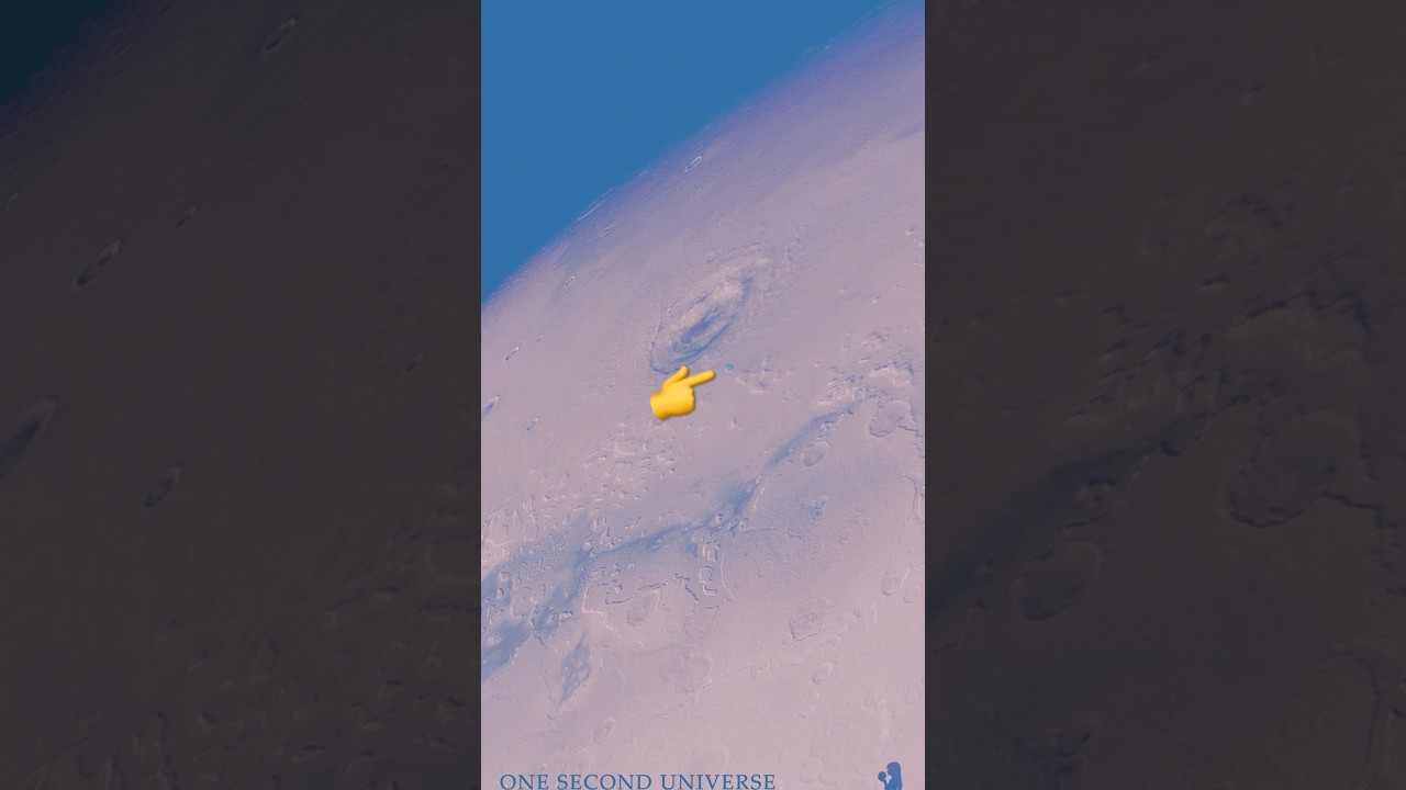 Drifting Above the Great Scar — Deimos Over Lyot Crater