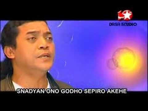 download lagu mp3 mp4 Didi Kempot Ojo Sujono, download lagu Didi Kempot Ojo Sujono gratis, unduh video klip Didi Kempot Ojo Sujono