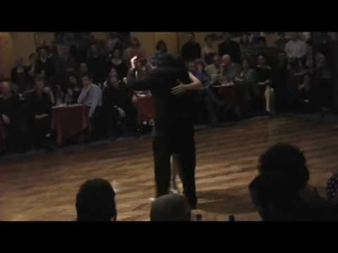  Corina de la Rosa  and  Julio Balmaceda  are  dancing  to  a  tango