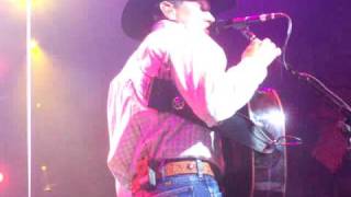 George Strait, doing High Tone Woman