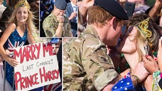 The moment a blonde steals a kiss from Prince Harry