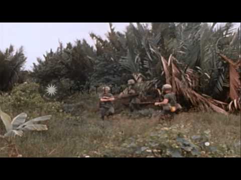 US soldiers prepare plastic explosives, place in a bunker and wade through knee d...HD Stock Footage