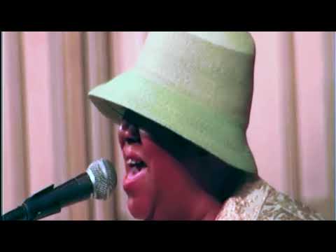 Aretha Franklin sings Amazing Grace at Luther Vandross's funeral.