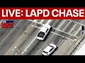 SKYFOX Heavily Armed Suspect In Police Chase Of Vehicle In LA