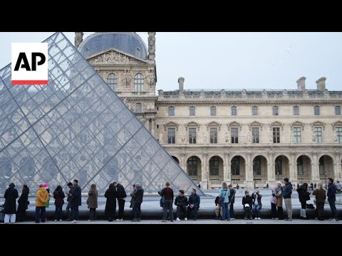 Visitors react to price hike at Paris' Louvre to shore up museum finances