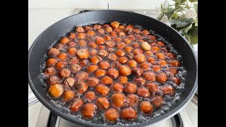 Drop hazelnuts into boiling water.  The whole world will use this method.